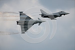 two Typhoon Eurofighter different flight attitudes show photo