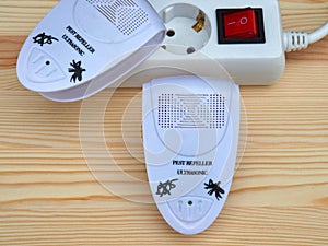 Two ultrasonic pest repellents. Device for repelling mosquitoes and flies