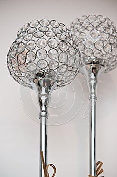 Two unique silver chrome lamps