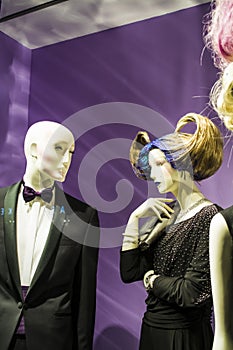 Two unusual dummies and original hairstyle. The girl with blue hair and in a black dress. Modern fashion.