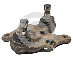 Two used rusty dysfunctional suspension ball joints, isolated on a white background