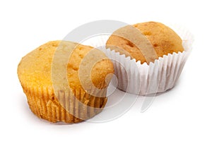 Two vanilla muffins with napkin on the white