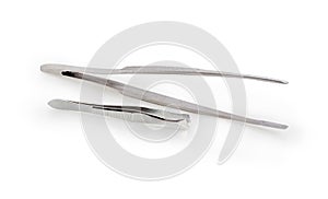 Two various steel tweezers on a white background