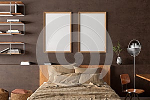 Two vertical  blank posters frames blank poster frame mock up on the brown  concrete wall in interior of industrial bedroom