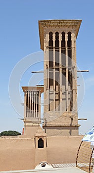 Two very old wind towers in Yazd, with unique Iranian decorations and architecture, Yazd, Iran