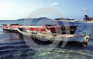 Two very old and worn fishing boats