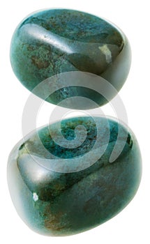 Two vesuvianite (idocrase) gemstones isolated photo