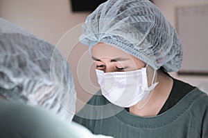 Two veterinarian surgeons in operating room