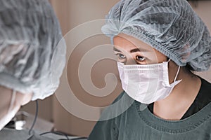 Two veterinarian surgeons in operating room