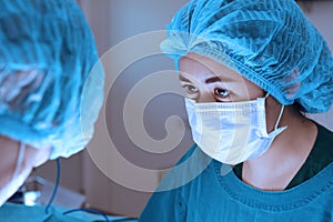 Two veterinarian surgeons in operating room photo