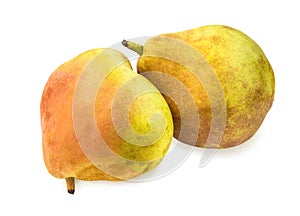 Two vibrant ripe pears with spotty pear skin on white.