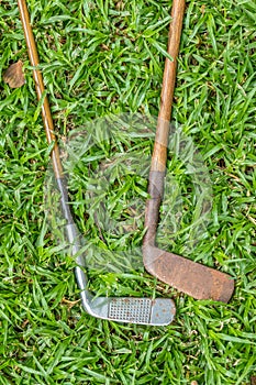 Two vintage golf clubs 