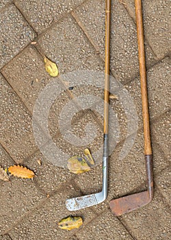 Two vintage golf clubs isolated