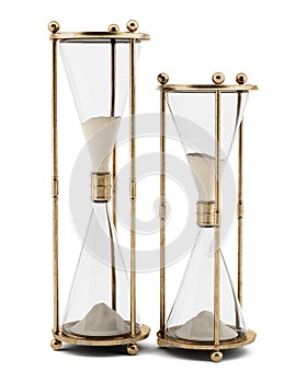 Two vintage hourglasses isolated on white