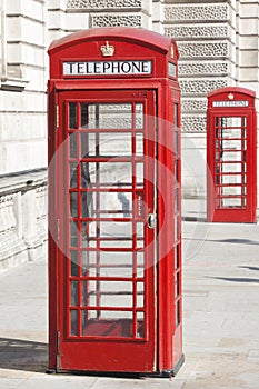 Two Vintage Red London Telephone Booths