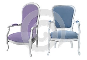 Two vintage white wooden chairs with blue and purple velvet upholsteryisolated on white background.