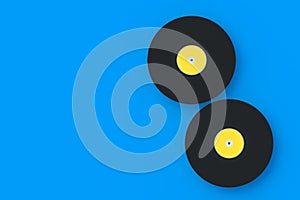 Two vinyl records on blue background