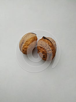 Two walnuts isolated
