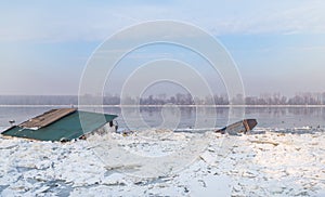 Two water objects trapped on frozen river Danube