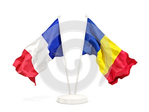 Two waving flags of France and romania isolated on white