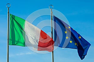 Two waving flags of ITALY and EUROPEAN UNION