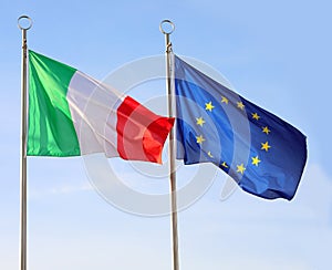 Two waving flags of Italy and European Union