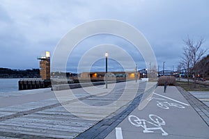 Two-way bicycle lane along the Samuel-de-Champlain boulevard seen during a dark blue hour dawn