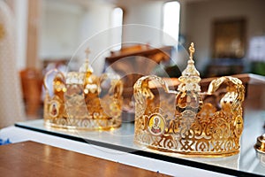 Two wedding crowns at church on wedding ceremony.