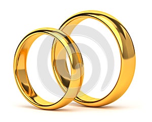 Two wedding gold rings isolated on white. Unity, love concept