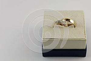 Two wedding rings in box