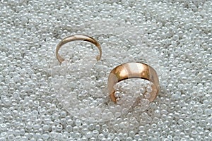 Two wedding rings on the pearls