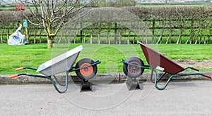 Two wheelbarrows
