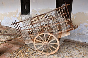 Two-wheeled antique cavalry wagon or trailer.