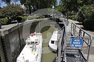 Ships in a canal with a lock