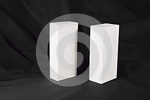 two white boxes on a black background