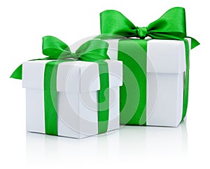 Two White boxs tied green ribbon bow Isolated on white background