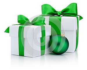 Two White boxs tied green satin ribbon bow and christmas ball