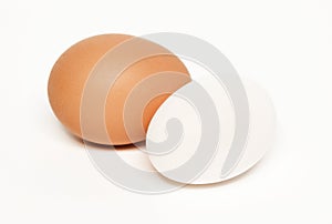 Two White And Brown Eggs