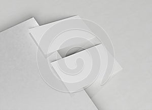 Two white business card Mockup. Textured calling card template on a blank surface. 3D rendering