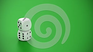 Two white dice on the green