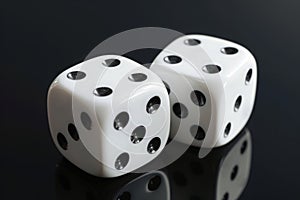 Two white dices falling on table on black background