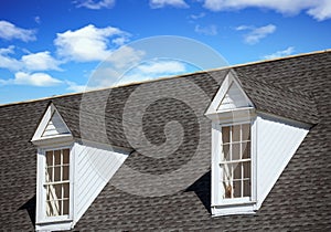 Two White Dormers on Grey Shingle Roof