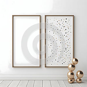Two white empty frames on the wall with dots all around decorated with gold baubles