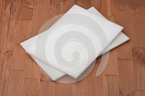 Two white foam sheets