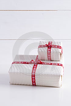 Two white gift boxes with polka dots