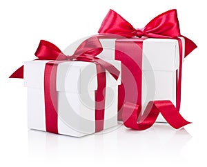 Two white gift boxes tied burgundy ribbon bow Isolated on white