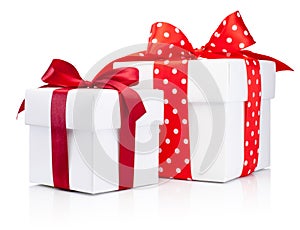 Two white gift boxes tied red ribbon bow  on white background