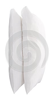 Two white pillows in stack isolated on white background with clipping path