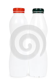 Two white plastic bottles with drink yogurt or milk. Isolated on white background. Container merchandise template