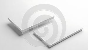 Two white rectangular blocks on a plain white surface